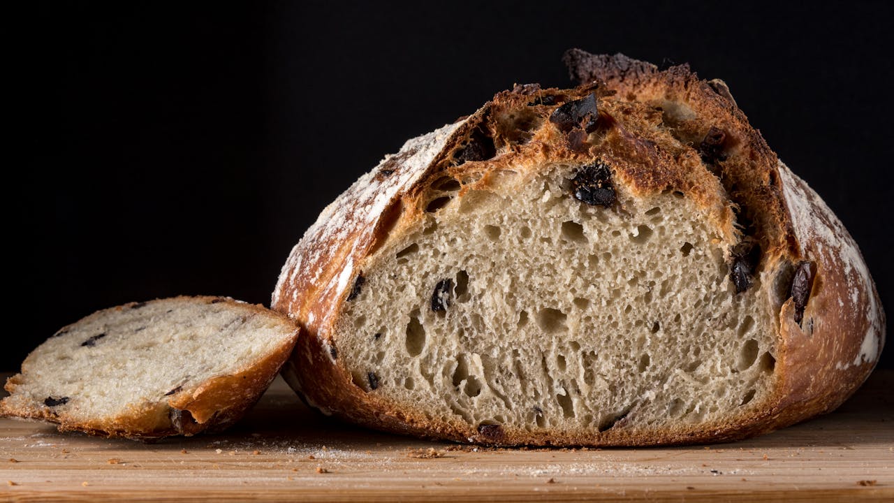 Sliced Bread on Brown Wooden Surface